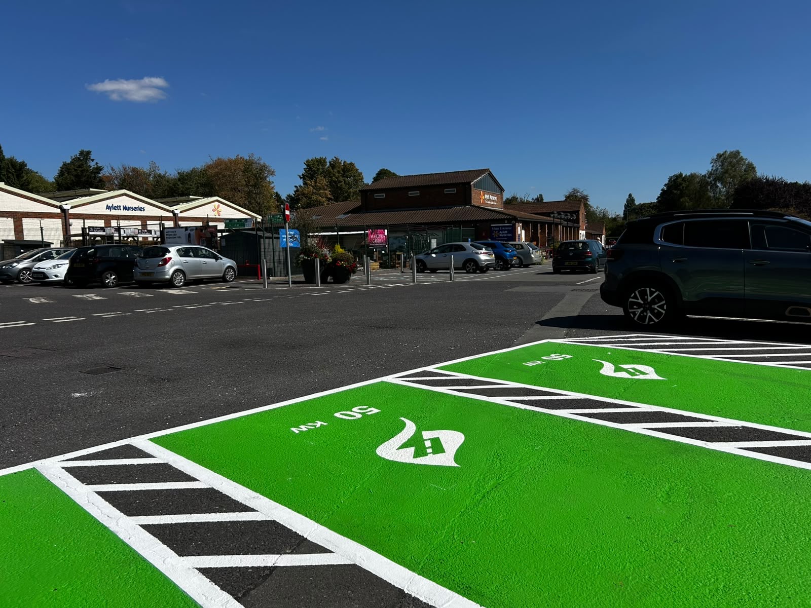 ElectRoad charging bays outside Aylett Nurseries, a garden centre destination